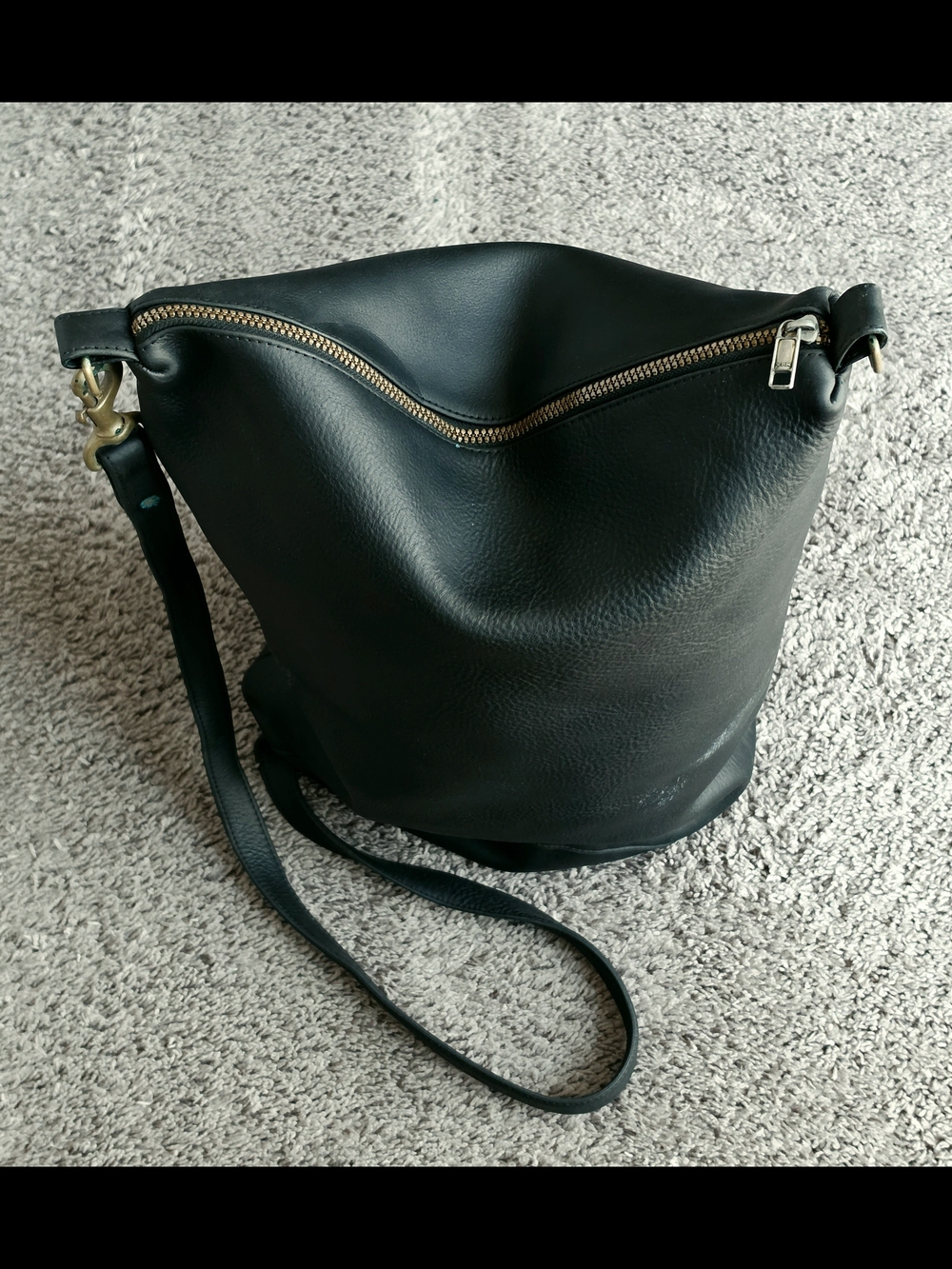 Classic Black Leather Crossbody Bag with Gold Zip